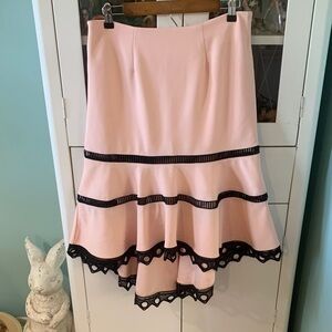 Venus sz 10 Pink Skirt with Black Trim euc Longer in Back